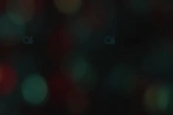 Dark and Subtle Red and Teal Bokeh Lights for Atmospheric Motion Graphics