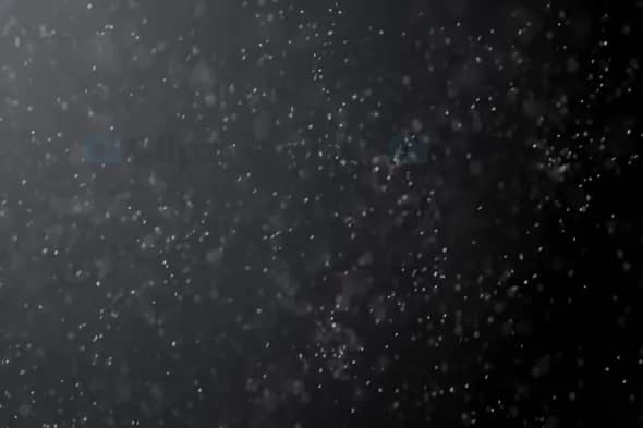 Glowing Snowfall in Fog – Soft Winter Particle Background