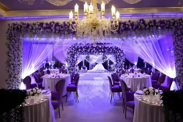 Luxurious Wedding Reception with Elegant Floral Decor - Purple and White Theme