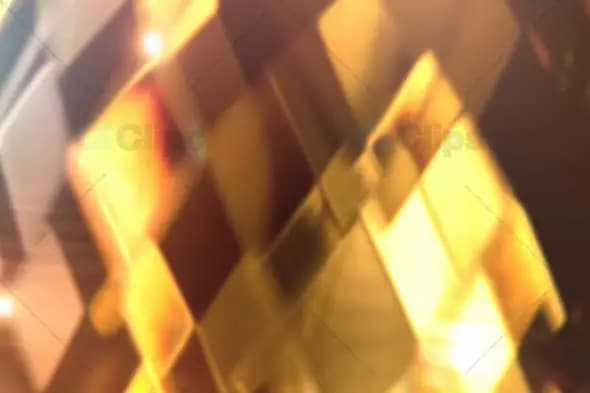 Golden Faceted Crystal with Shimmering Light Reflections