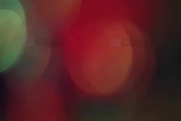 Muted Red and Green Bokeh Lights for Artistic Motion Graphics
