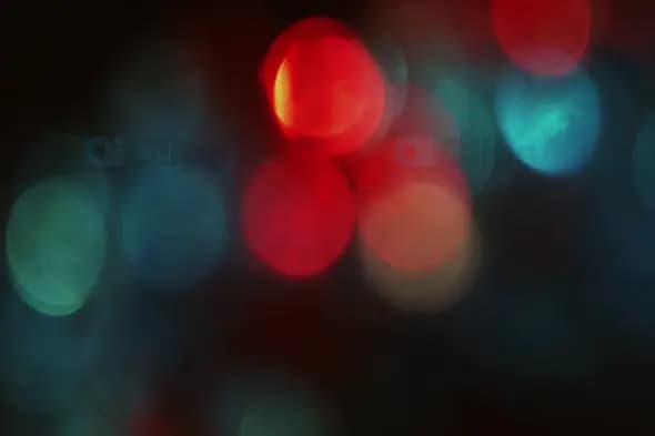 Bold Red and Teal Bokeh Lights for Energetic Motion Graphics