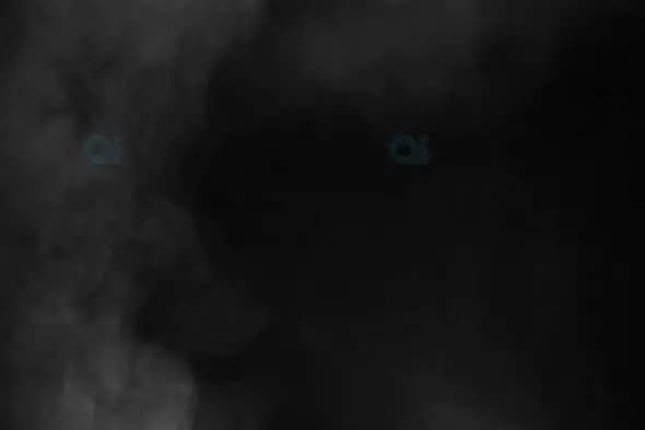 Dark Grey Smoke Swirling in a Mist