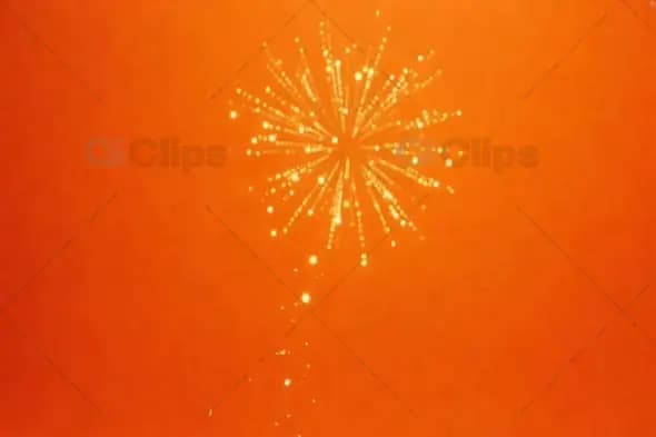 Golden Fireworks Burst on Vibrant Orange Background