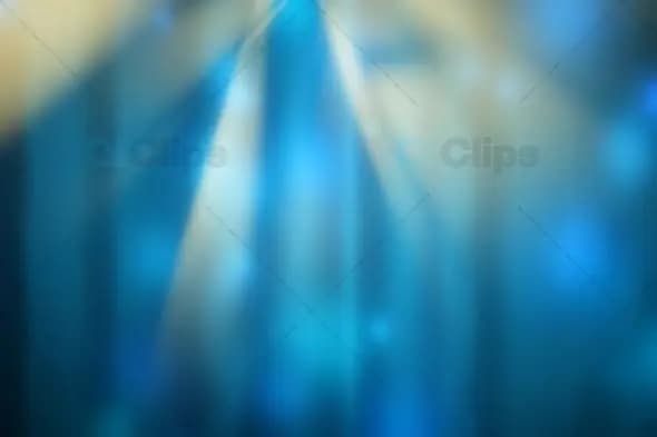 Dreamy Blue and Gold Light Rays Bokeh