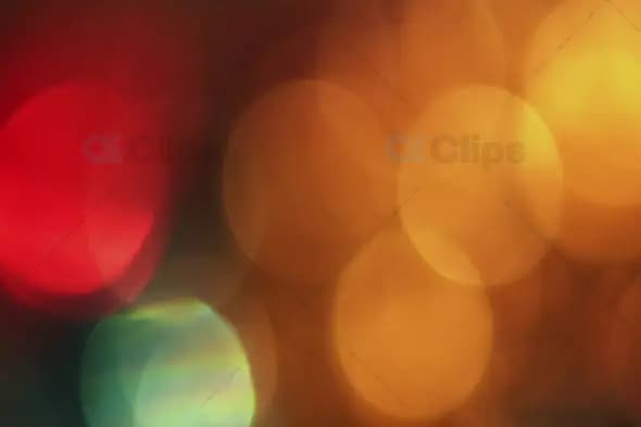 Festive Red, Green, and Golden Bokeh with Soft Light Orbs