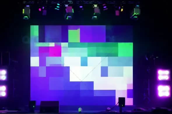 Colorful Pixelated Digital Screen Display on Stage with Lights
