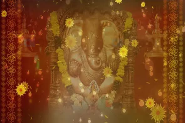 Lord Ganesha with Floral Garlands and Glowing Light Effects in Festive Setting Animation