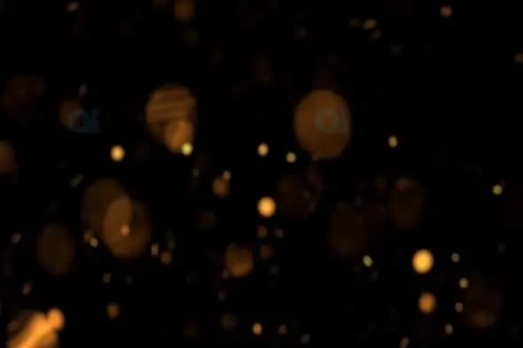 Luxurious Golden Bokeh Lights on Black Background for Motion Graphics