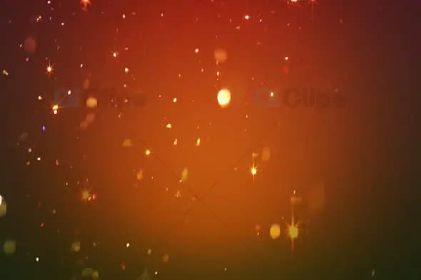 Warm Red and Orange Sparkling Bokeh with Glowing Lights