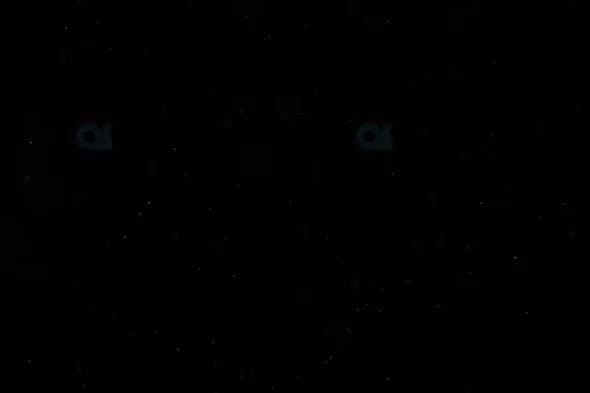 Minimal Snowfall on Black Background – Subtle Winter Particle Motion