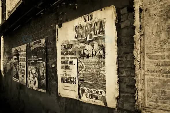 Vintage Posters on Brick Wall with Weathered, Sepia-Toned Aesthetic