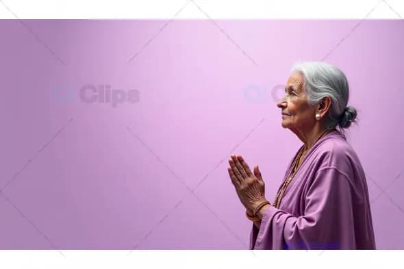 Peaceful Elderly Woman in Prayer Against Lavender Background