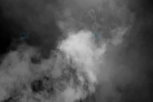 Thick Grey Smoke Rising in the Darkness