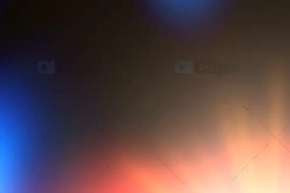 Soft Blue and Orange Light Burst Background