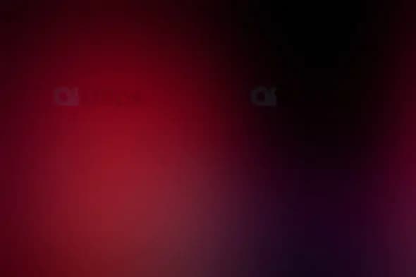Dark Red and Black Gradient with Purple Hints Background