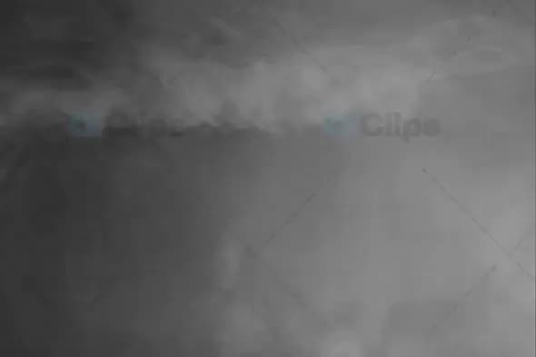 Grey Smoke Drift Over Dark Background