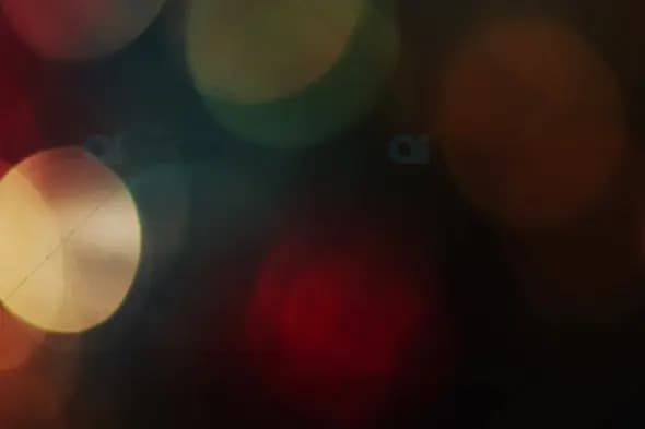 Warm Red and Gold Bokeh Lights for Elegant Motion Graphics