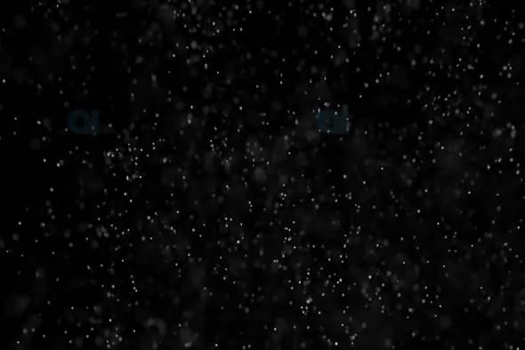 Dense Snowfall on Black Background – Winter Particle Motion Effect