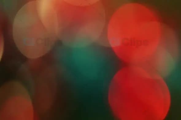 Festive Red and Green Bokeh with Soft Light Orbs