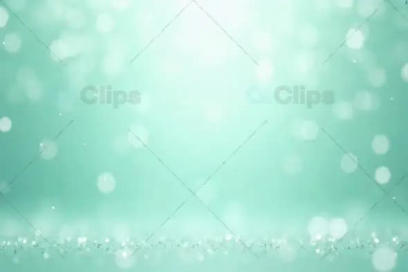 Soft Teal Bokeh and Sparkles Background