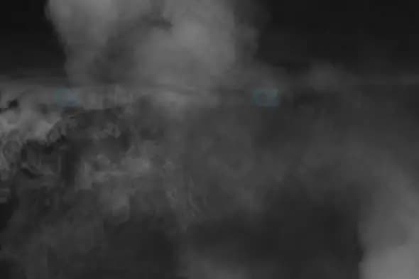 Thick Grey Smoke Rising Against Dark Background