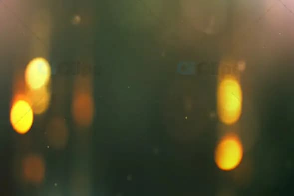 Soft Golden Bokeh Glow with Gentle Light Orbs