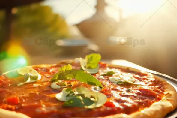 Freshly Baked Pizza in Sunlight - Gourmet Italian Cuisine