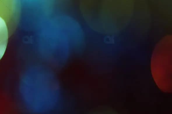 Vibrant Red, Gold, and Blue Bokeh Lights for Festive Motion Graphics