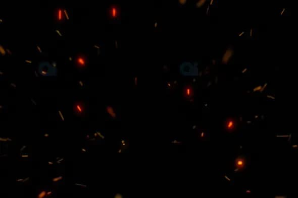 Fiery Sparks Flying Toward Camera – Dynamic Particle Motion