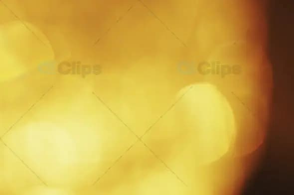 Warm Golden Bokeh Lights for Festive Motion Graphics