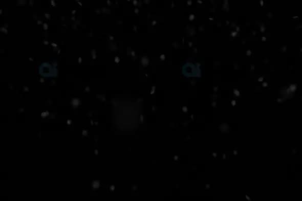 Gentle Snowfall on Black Background – Minimal Winter Particle Motion
