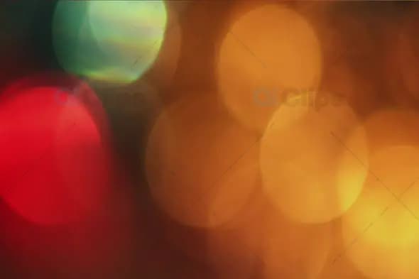 Festive Bokeh with Warm Yellow, Red, and Green Light Orbs