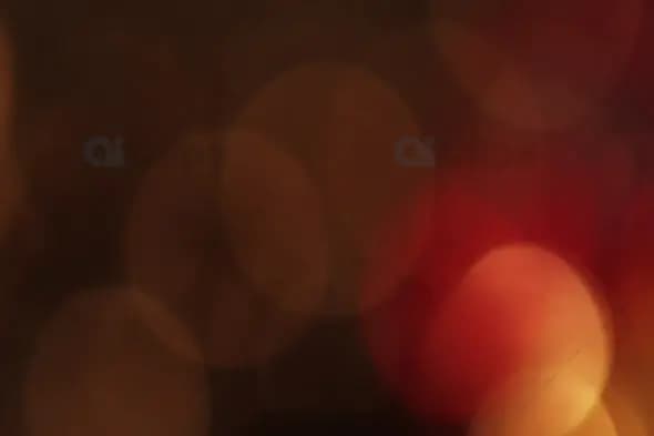 Dark Red and Green Bokeh Lights for Cinematic Motion Graphics