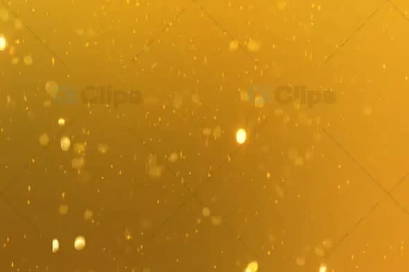 Golden Floating Particles with Soft Glow