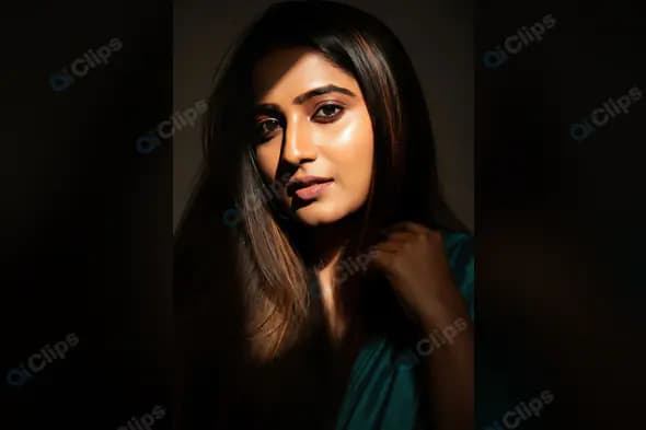 Elegant Indian Woman in Moody Portrait Lighting