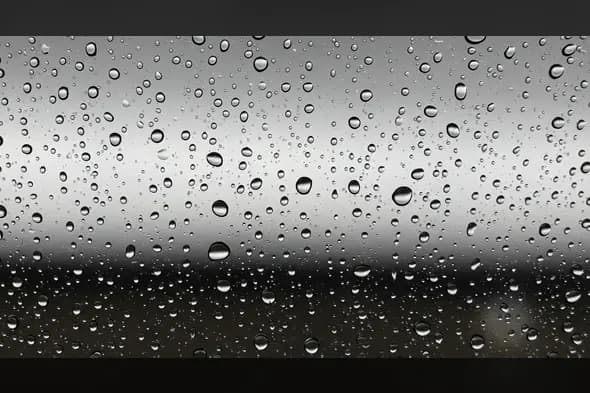 Close-Up Rain Drop Texture on Glass Window – Cloudy Mood Overlay