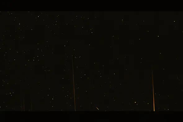 Dark Starry Grunge Texture with Vertical Light Streaks background