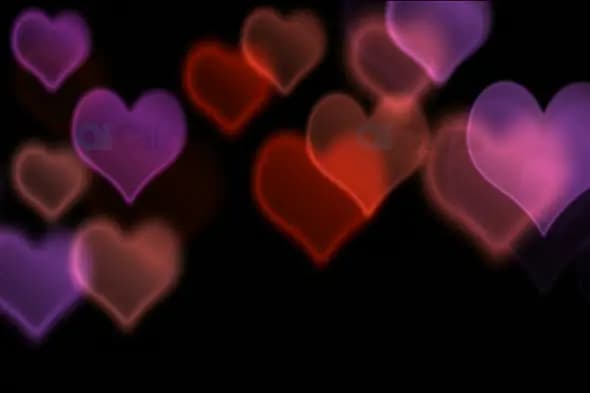 Soft Glowing Red and Purple Hearts on Black Background