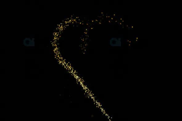 Glittering Golden Heart Particle Animation on Black Background