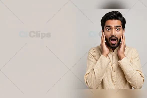 Expressive Indian Man Shocked in Traditional Attire