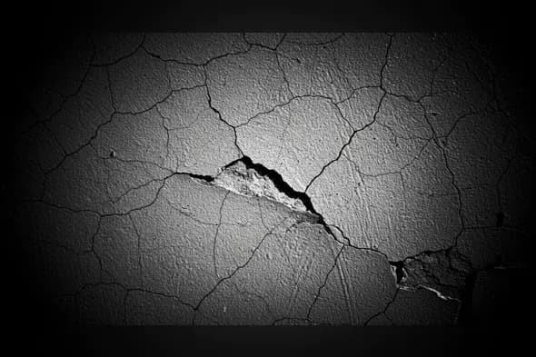 Dark Cracked Surface Texture