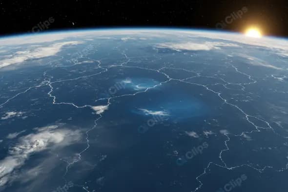 Earth's Ocean Surface from Orbit with Sunrise and Cloud Patterns
