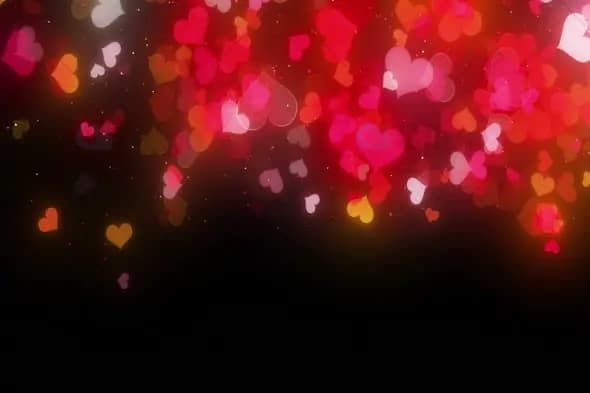 Colorful Heart Particles on Black Gradient Background