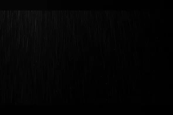 Realistic Rainfall Texture on Black Background