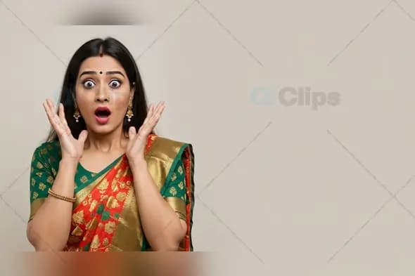Startled Woman Expressing Amazement in Ethnic Wear