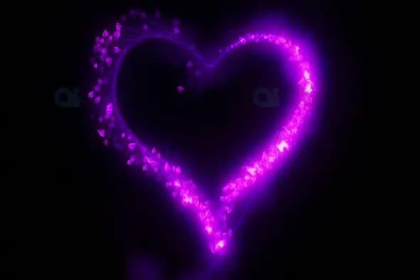 Glowing Purple Heart Animation with Sparkling Particles on Black Background
