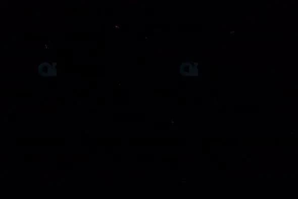 Glitter Particle Sparkles on Black Background - Subtle Motion Graphic