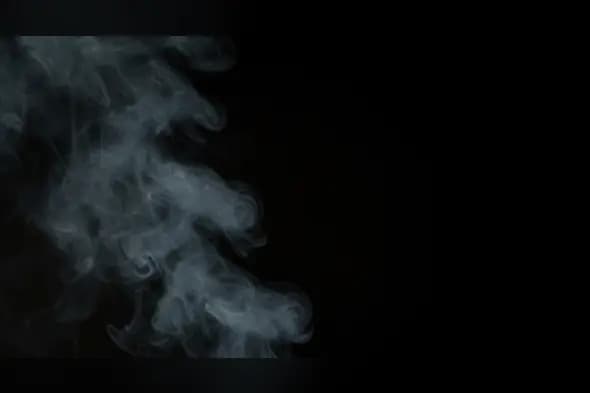 Realistic White Smoke Flow on Black Background