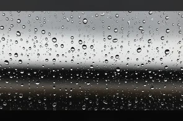 Rain Drops on Glass with Overcast Horizon